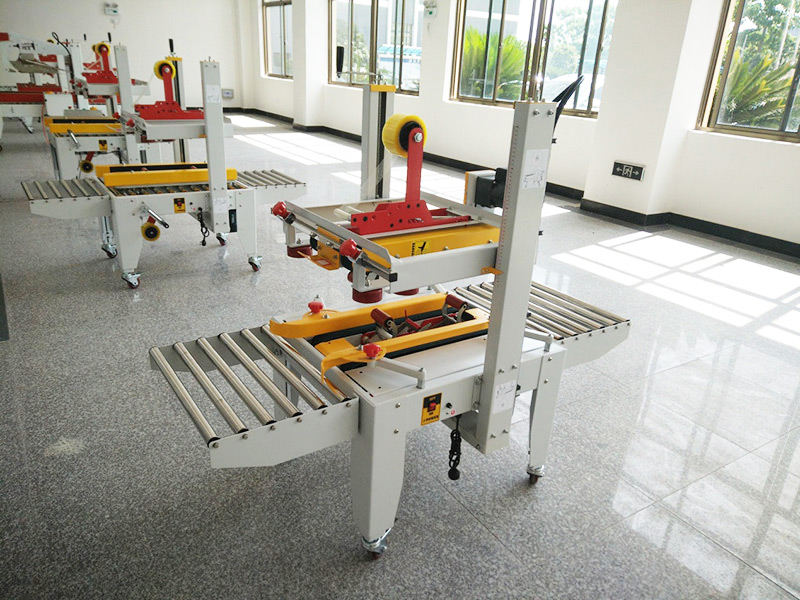 JS-FX500C 上下驅(qū)動(dòng)手動(dòng)折蓋膠帶封箱機(jī)